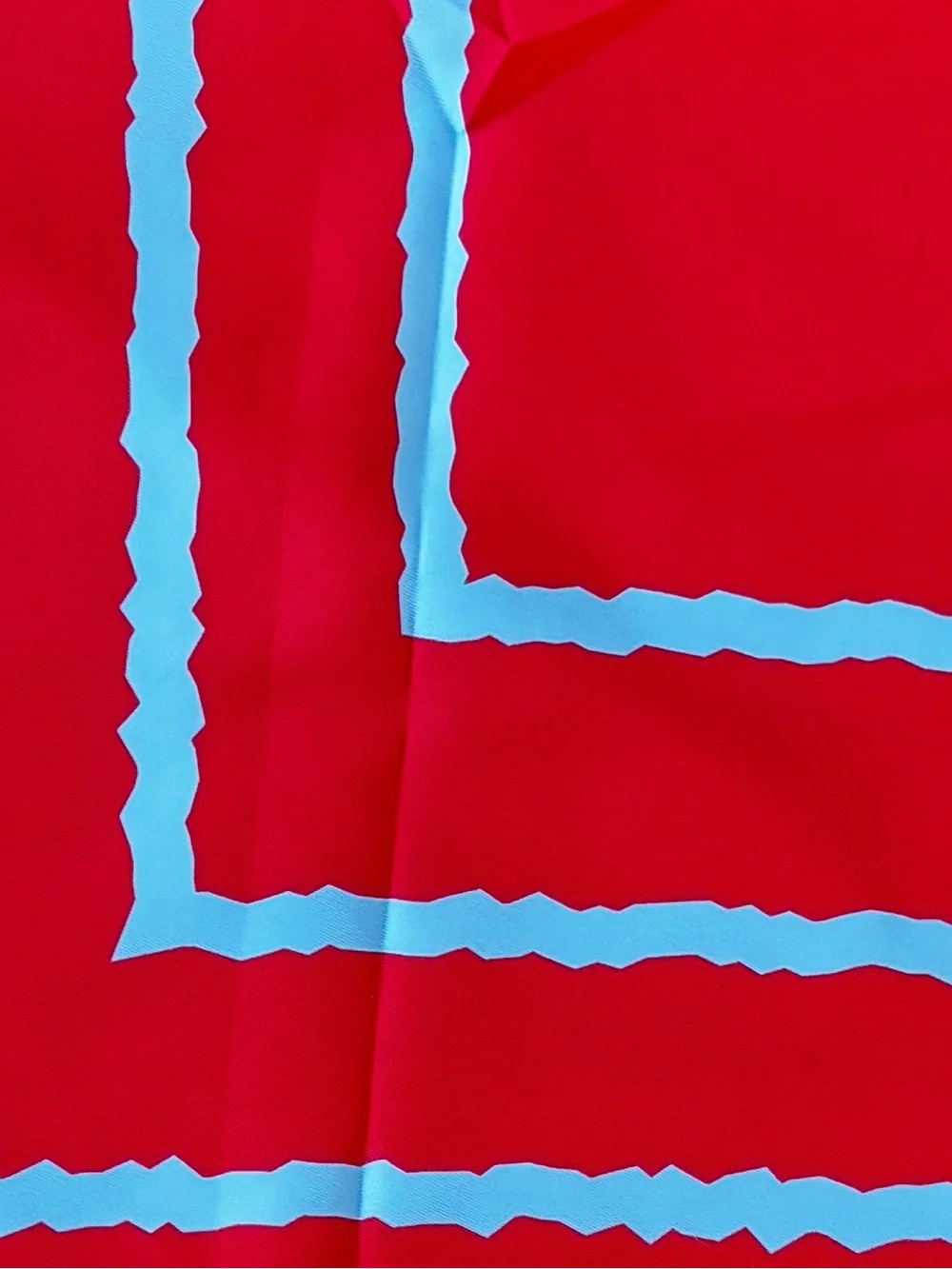 Red Tablecloth with Light Blue Stripe Accent - Home Dining